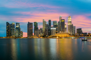 Fototapeta na wymiar Singapore skyscraper building at Marina Bay in night, Singapore.