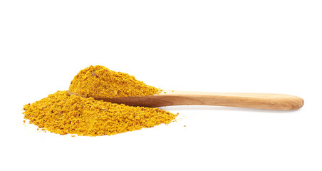 Pile of powdered curry spice isolated