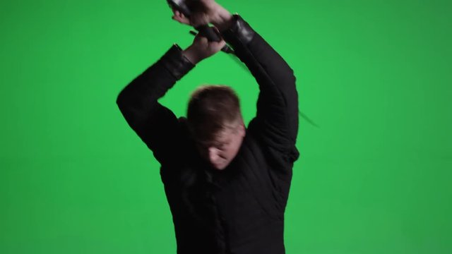 Warrior Battling with Sword on Green Screen
