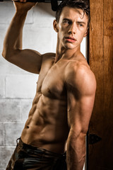 Fototapeta premium Athletic Man Flexing