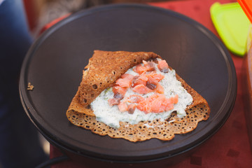 preparation of delicious pancakes with sauce