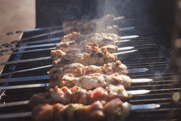 lots of fresh kebabs on the grill