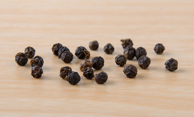 peppercorn on wood