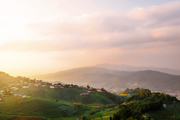 Mountain valley with local village during bright sunrise, Beautiful natural landscape