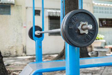 old barbell in the park