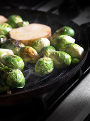 close up view of nice fresh vegetables is being fried