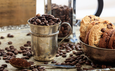 Two cups with coffee beans