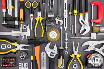 set of hand various work tools on grey background top view - Powered by Adobe