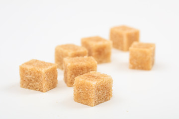 Sugar cubes on white background