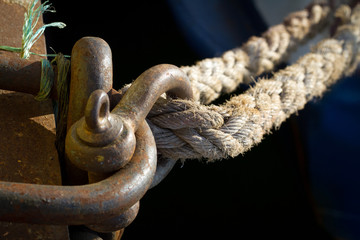 mooring rope and rusty clamp