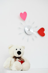 Clock with hearts on the wall