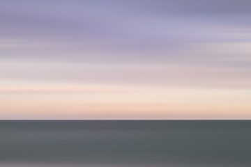 Stunning vibrant conceptual image of peaceful sea at sunset