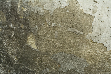 Old brick wall with plaster and decal