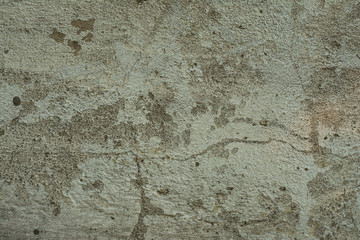 Old brick wall with plaster and decal