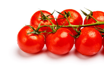 Plum tomatoes with leaves on white background