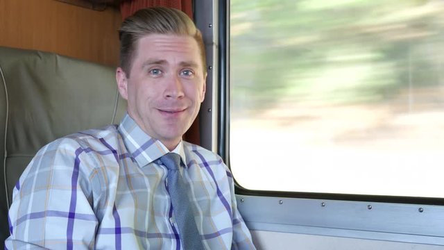 Portrait of man taking the train