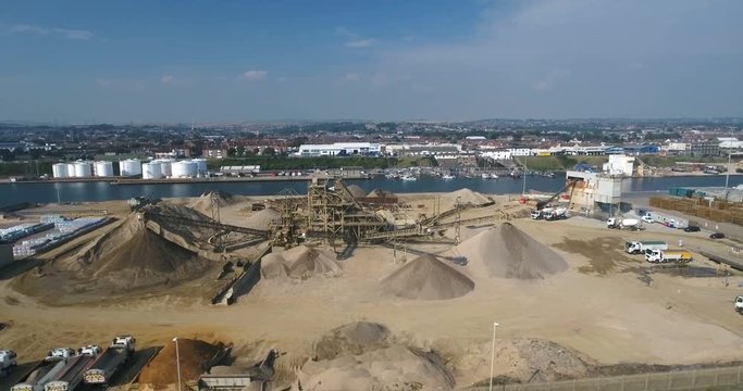 Aerial panning view of an industrial and commercial area near Brighton