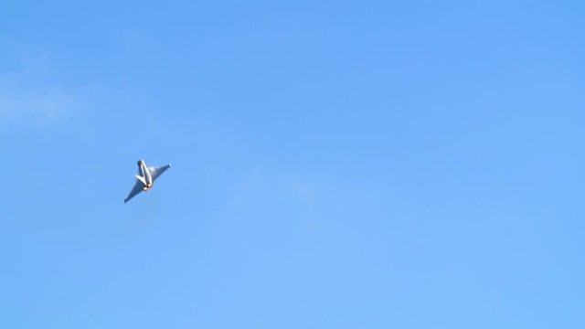 Slow motion display of a multi-role fighter combat aircraft at an air show