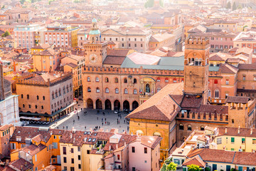Aerial cityscape view from the tower on Bologna old town center with Maggiore square in Italy - obrazy, fototapety, plakaty