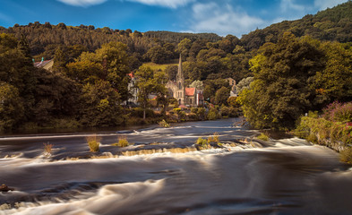 The river Dee and the Llangollen Methodist Church at Llangollen, North Wales, UK.