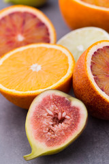 Bloody Sicilian oranges and figs. Shallow depth of field.