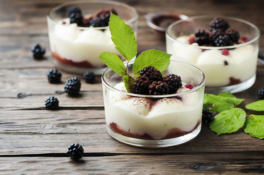 Homemade Dessert With Blackberry And Cream