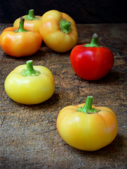 spicy yellow pepper on a wooden background. selective focus