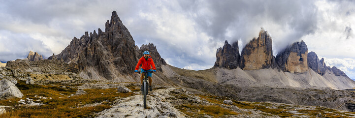 Mountain biking in the Dolomites, Tre Cime di Lavaredo, Italy.