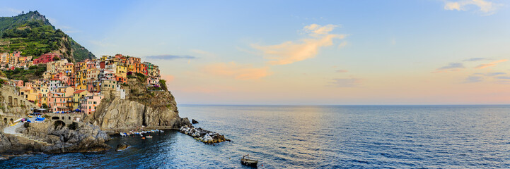 Amazing sunset view in Manarola one of the five villages of the Cinque Terre on Italy mediterranean...