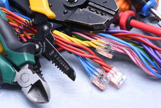 Set of tools for electrician and electrical cables
- Powered by Adobe