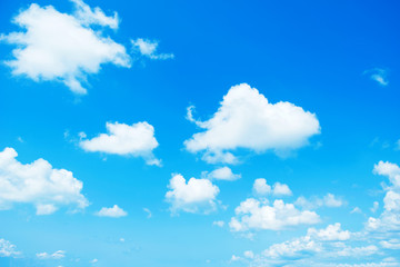 Naklejka na ściany i meble Blue sky with white clouds floating across the full sky.