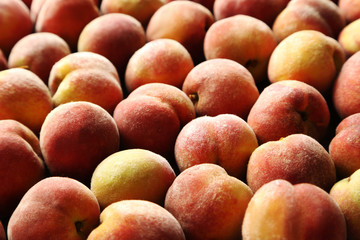 Fototapeta na wymiar Ripe and sweet peach fruit background