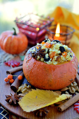 Pumpkin risotto made of rice with saffron and dried fruits