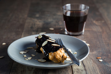 Homemade eclair in rustic style