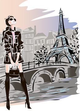 Fashion woman in Paris near Eiffel Tower