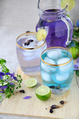 Jar and Glasses of Butterfly Pea Juice
