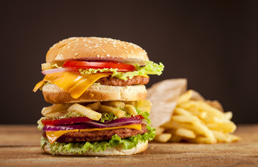 Fresh burger on wooden background
