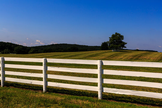 Farm In Maryland With Freshly Painted White Fence