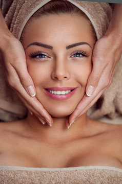 Close-up of a young woman getting spa treatment