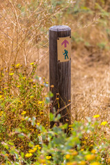 sign on a wooden post