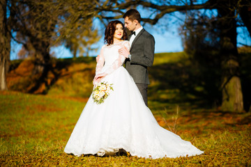 Young couple man and woman gently and passionately embracing each other