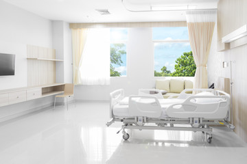 Fototapeta na wymiar Hospital room with beds and comfortable medical equipped