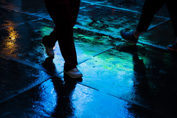 NYC streets after rain with reflections on wet asphalt
