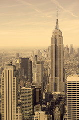 Tightly packed buildings and Manhattan skyline, New York City, sepia filter