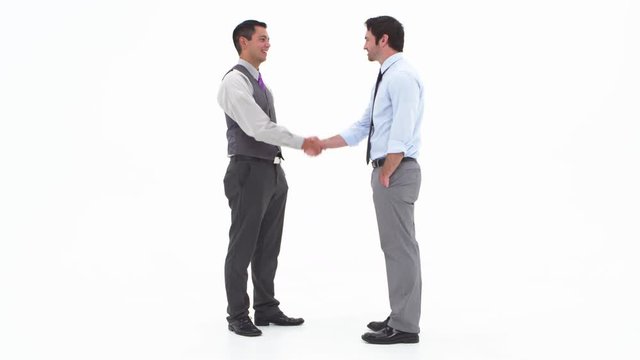 Two male coworkers shaking hands