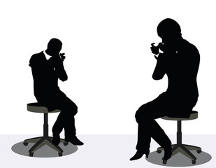 business man and woman silhouette on phone