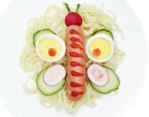 creative food dinner with pasta and sausage