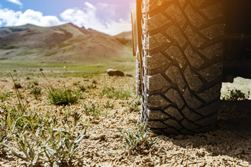 Closeup offroad car wheel concept © cppzone