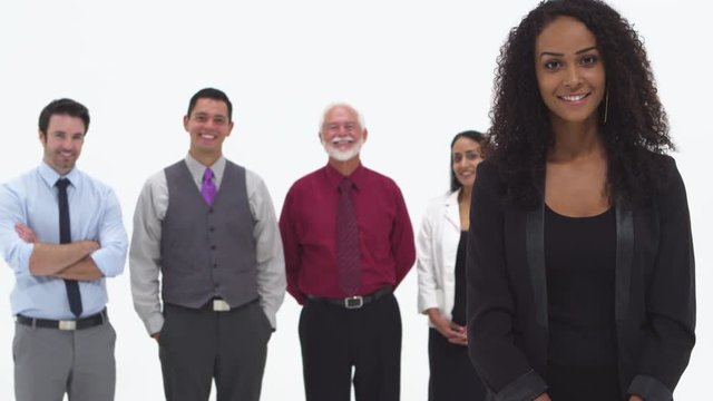 Closeup of African American businesswoman and coworkers