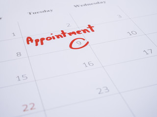 Obraz premium Handwhiting word appointment on calendar 4